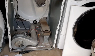 Drum and belt assembly inside a commercial dryer