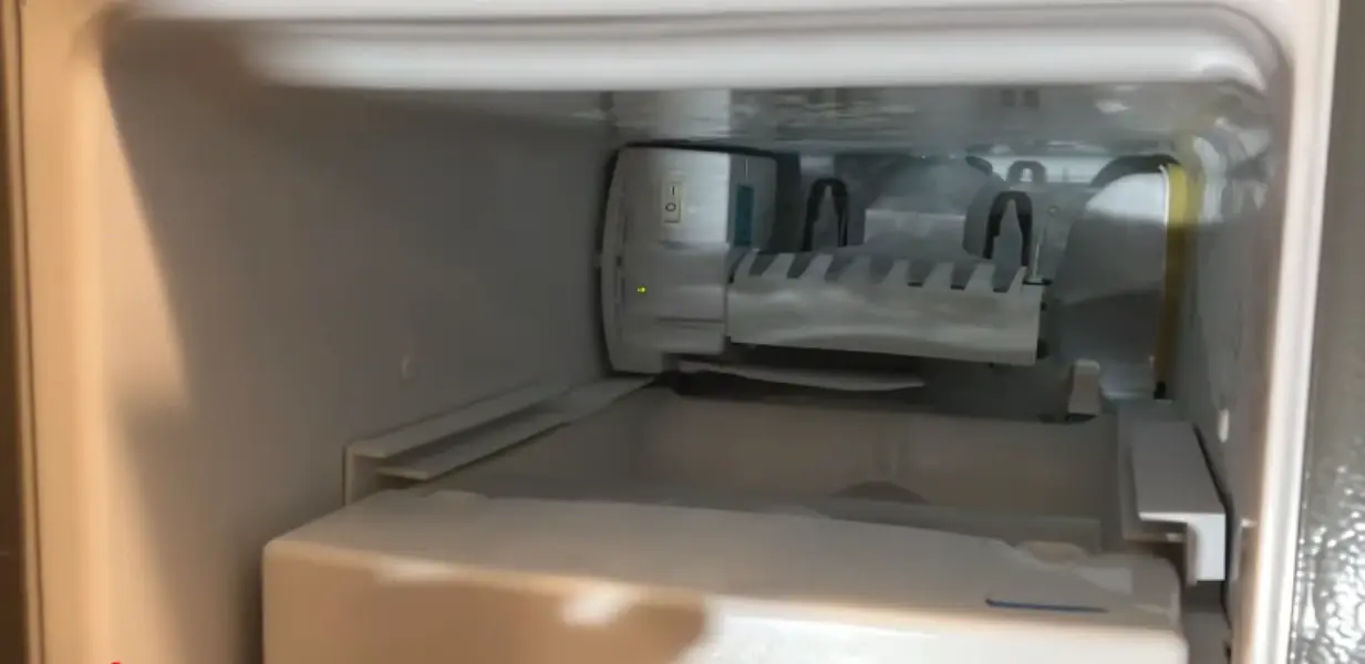 Ice maker unit inside a freezer compartment